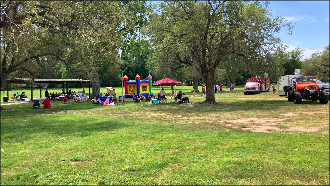 Outdoor picnic tables and park area for a Local 602 picnic